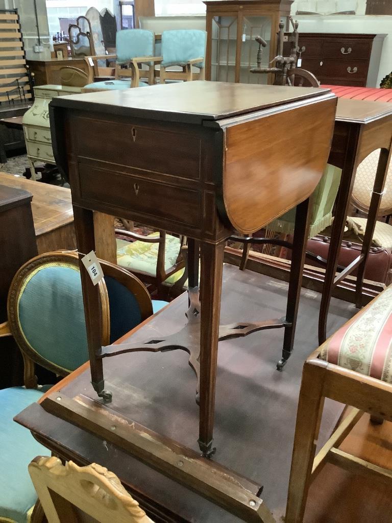 A George III inlaid mahogany drop flap work table, 77cm extended, width 48cm, height 74cm